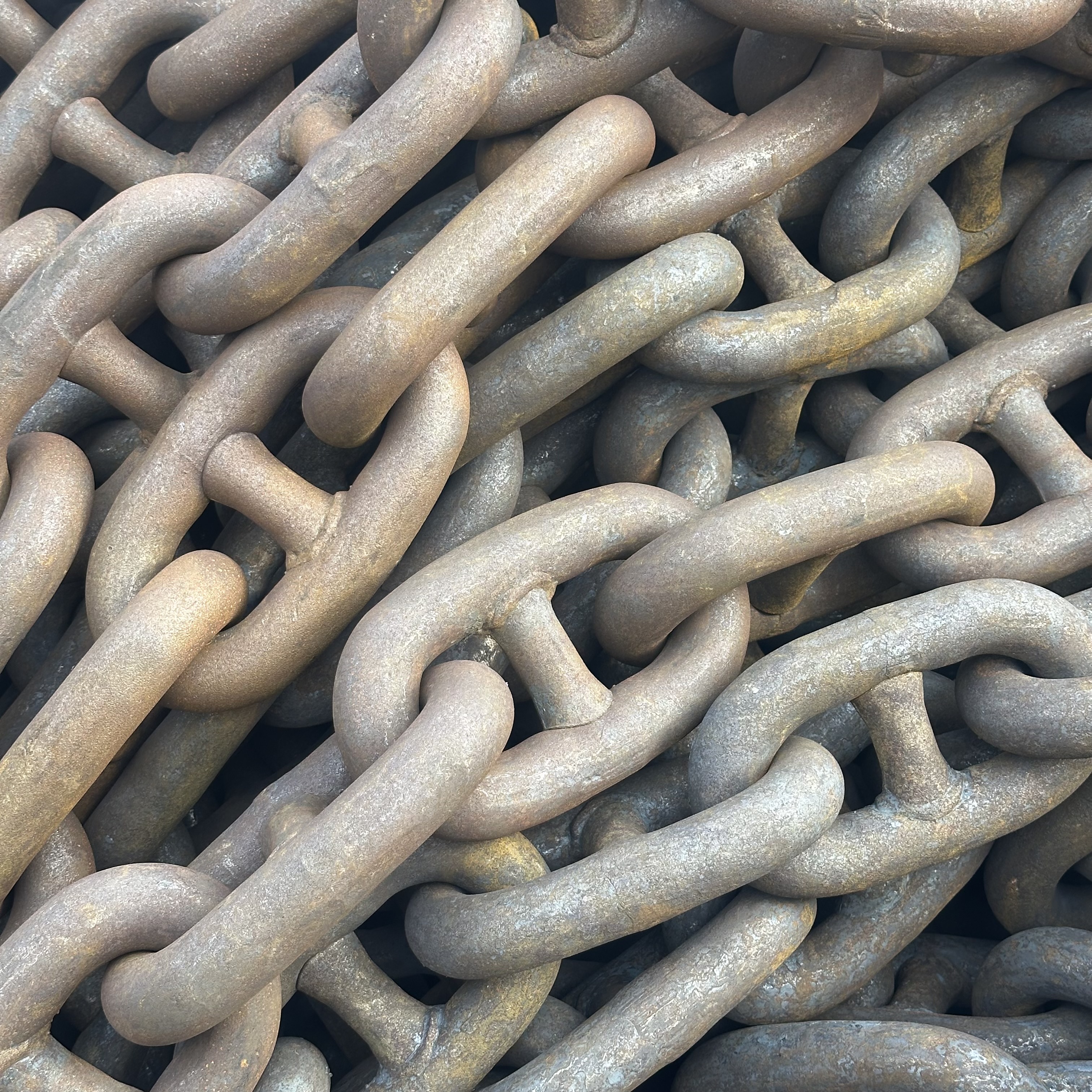 Modern manufacturing facility with automated production line showing workers in safety gear operating industrial machinery, clean factory floor with conveyor belts and quality control stations